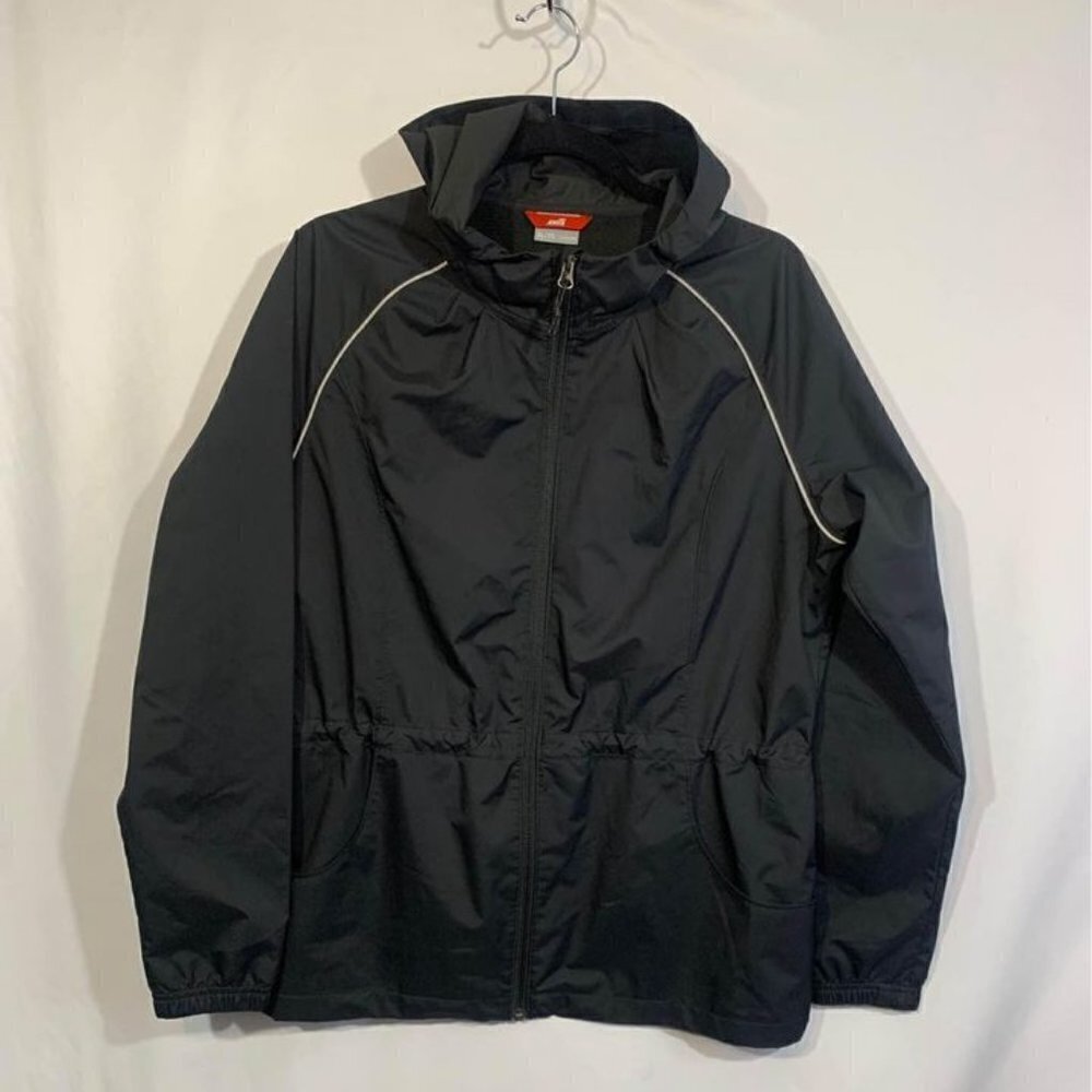 WOMAN’S golf jacket. AVIA size XL. Adjustable waist. Pockets. New without tags.